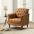 Fauteuil d'appoint capitonné en similicuir avec accoudoirs cloutés