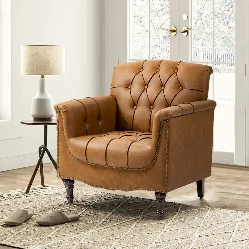 Fauteuil d'appoint capitonné en similicuir avec accoudoirs cloutés