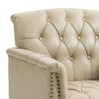 Fauteuil d'appoint capitonné en similicuir avec accoudoirs cloutés