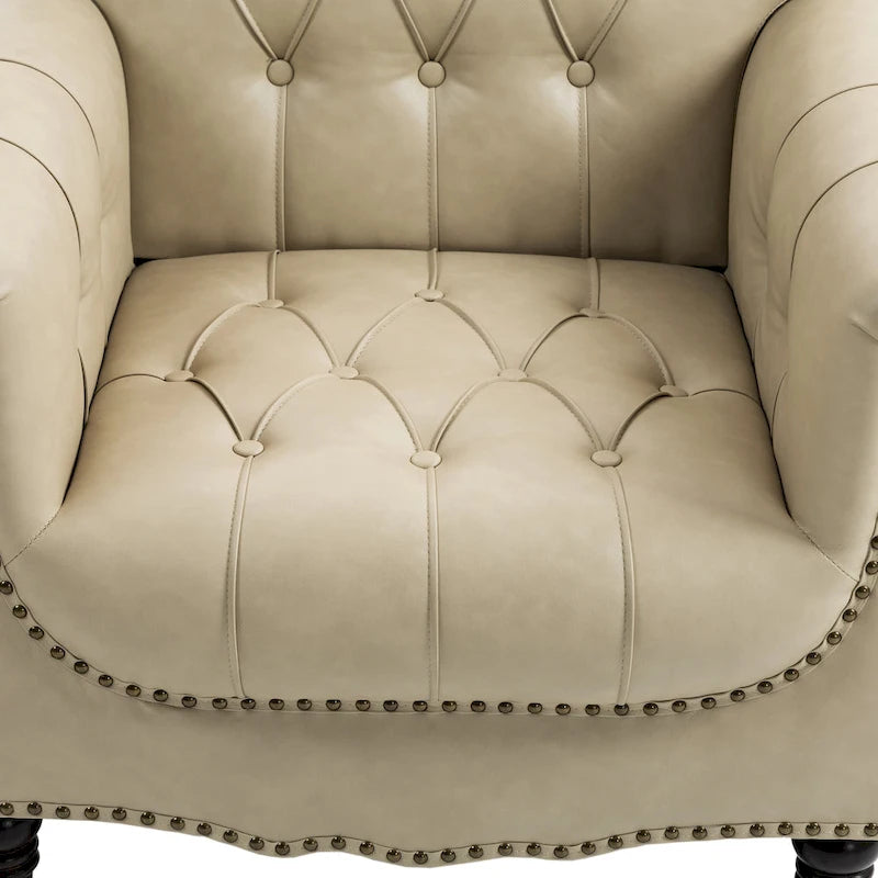 Fauteuil d'appoint capitonné en similicuir avec accoudoirs cloutés