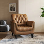 Fauteuil d'appoint capitonné en similicuir avec accoudoirs cloutés