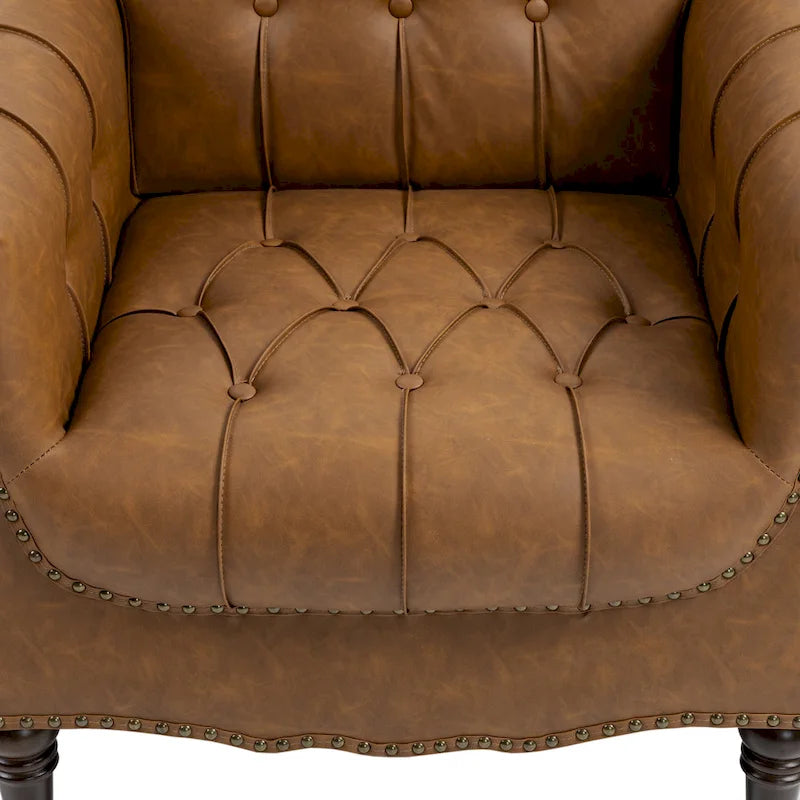 Fauteuil d'appoint capitonné en similicuir avec accoudoirs cloutés