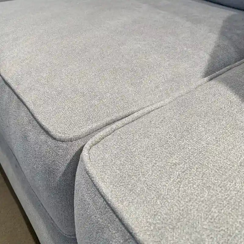 Causeuse en tissu à dossier moelleux
