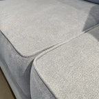 Causeuse en tissu à dossier moelleux